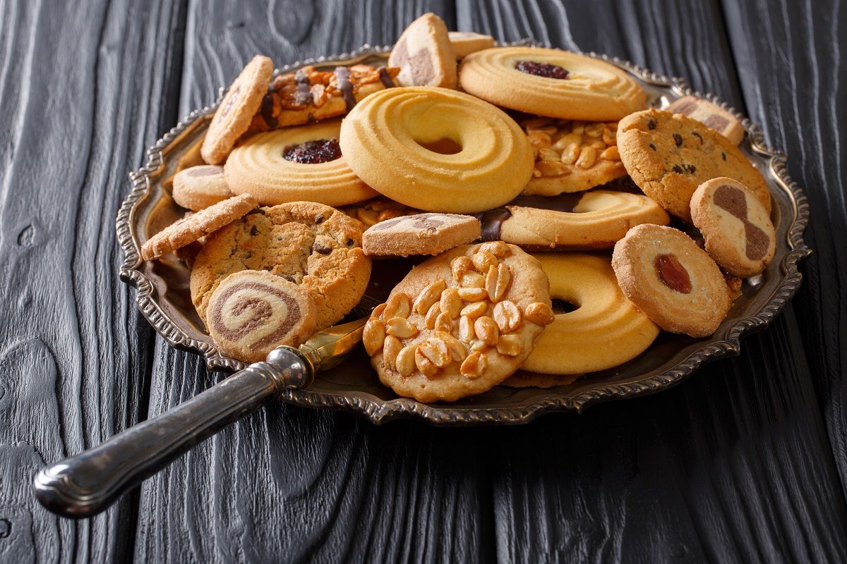 Freshly baked mix of biscuits close-up on a plate. horizontal