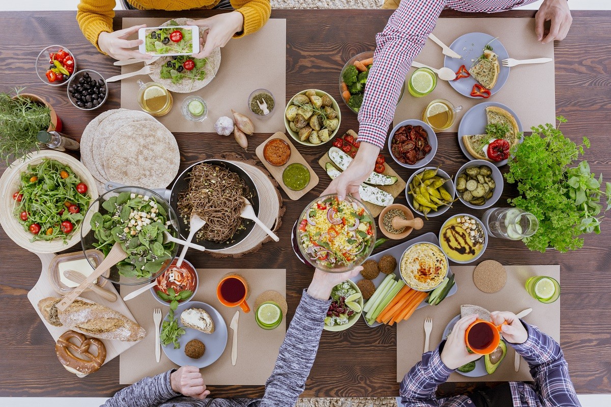 Friends having vegetarian feast