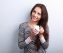 Beautiful calm thinking woman drinking coffee from cup