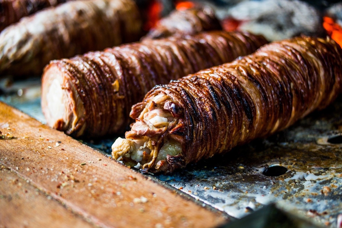 Turkish Street Food Kokorec made with sheep bowel cooked in wood