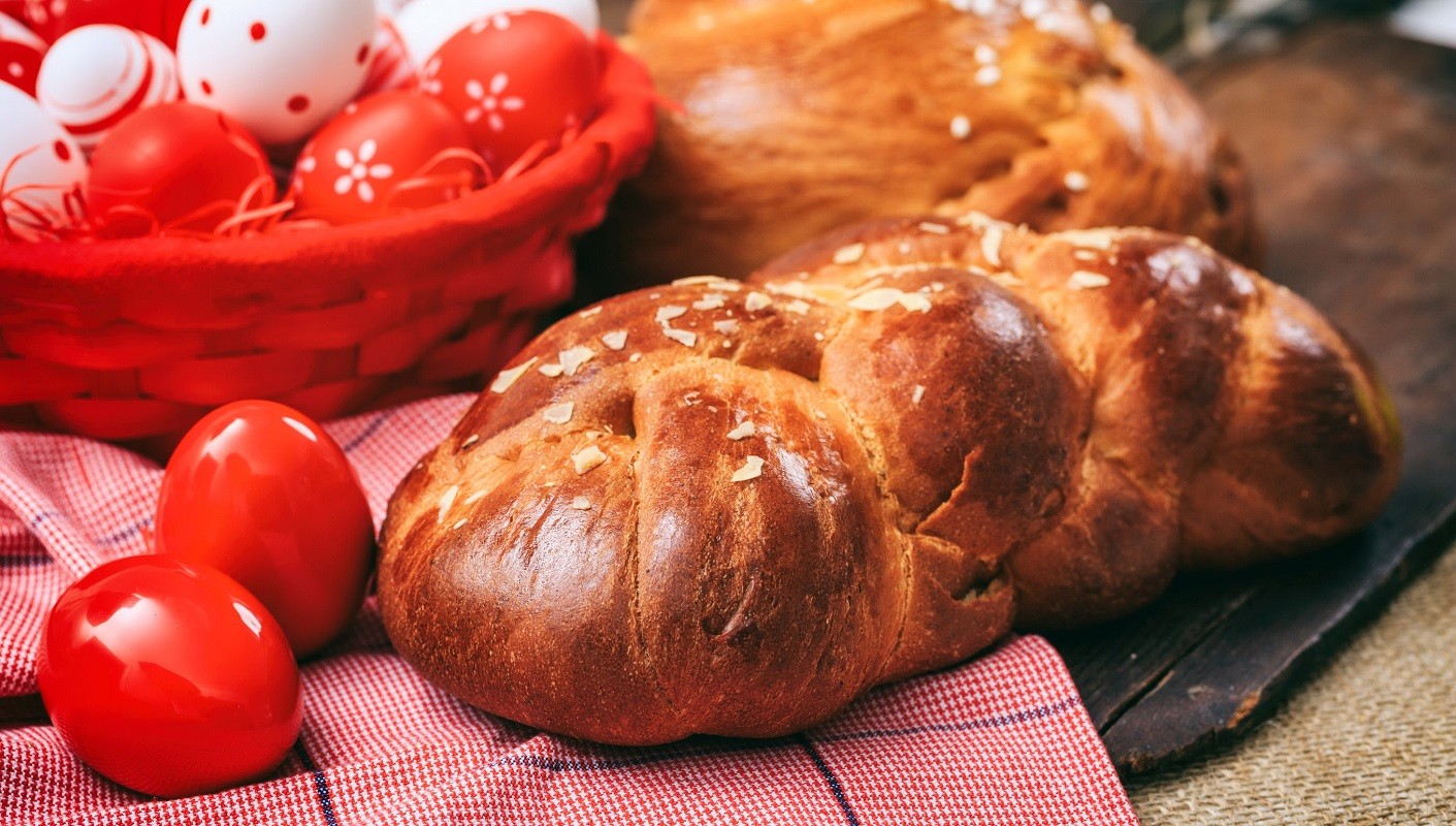 74453000 – easter greek tsoureki and eggs on wooden background