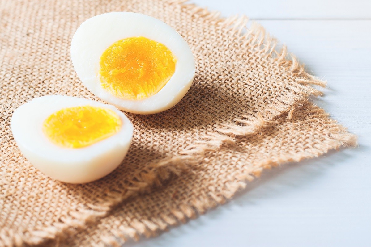 Two half of hard boiled egg on table, Healthy food, Nutrition co