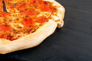 Pepperoni or Diabola Pizza with Salami, Chili Pepper Close Up