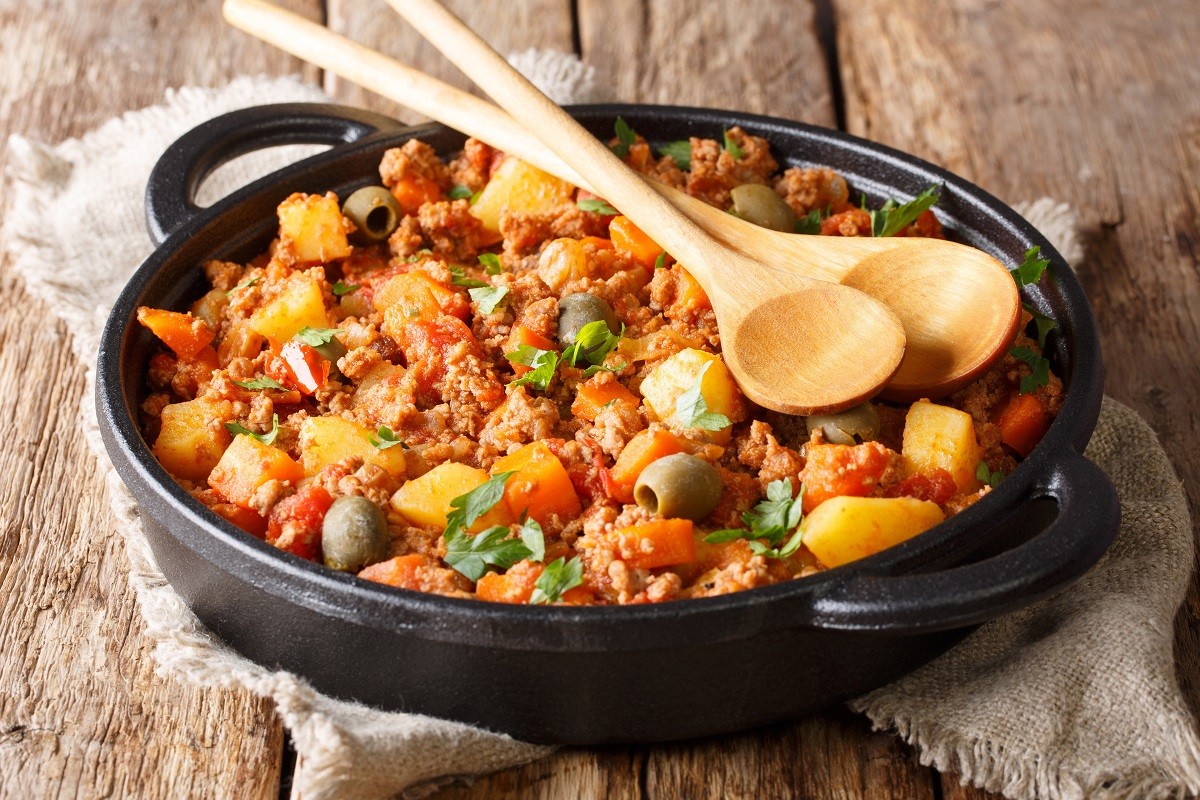 Beef Picadillo cooked with potatoes, carrots, raisins, olives an