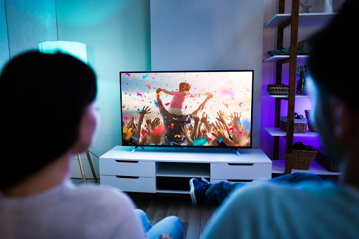 Family Couple Watching TV Or Movie