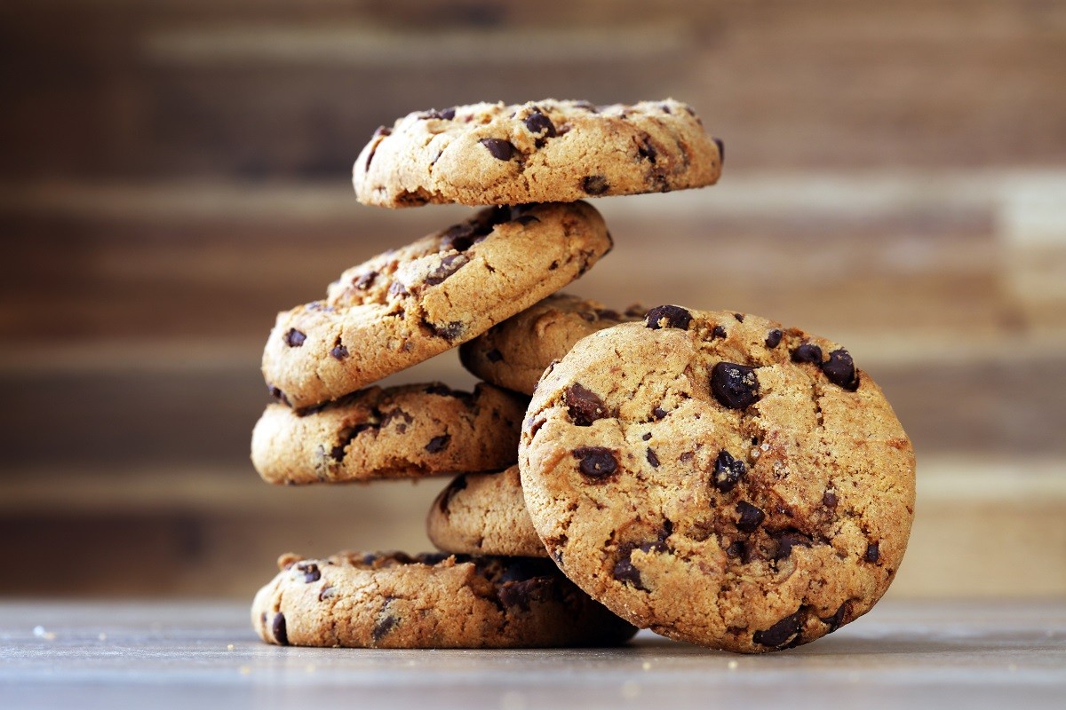 Chocolate cookies on wooden table. Chocolate chip cookies shot