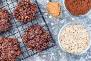 Flourless no bake peanut butter and oatmeal chocolate cookies on  cooling rack, horizontal, top view