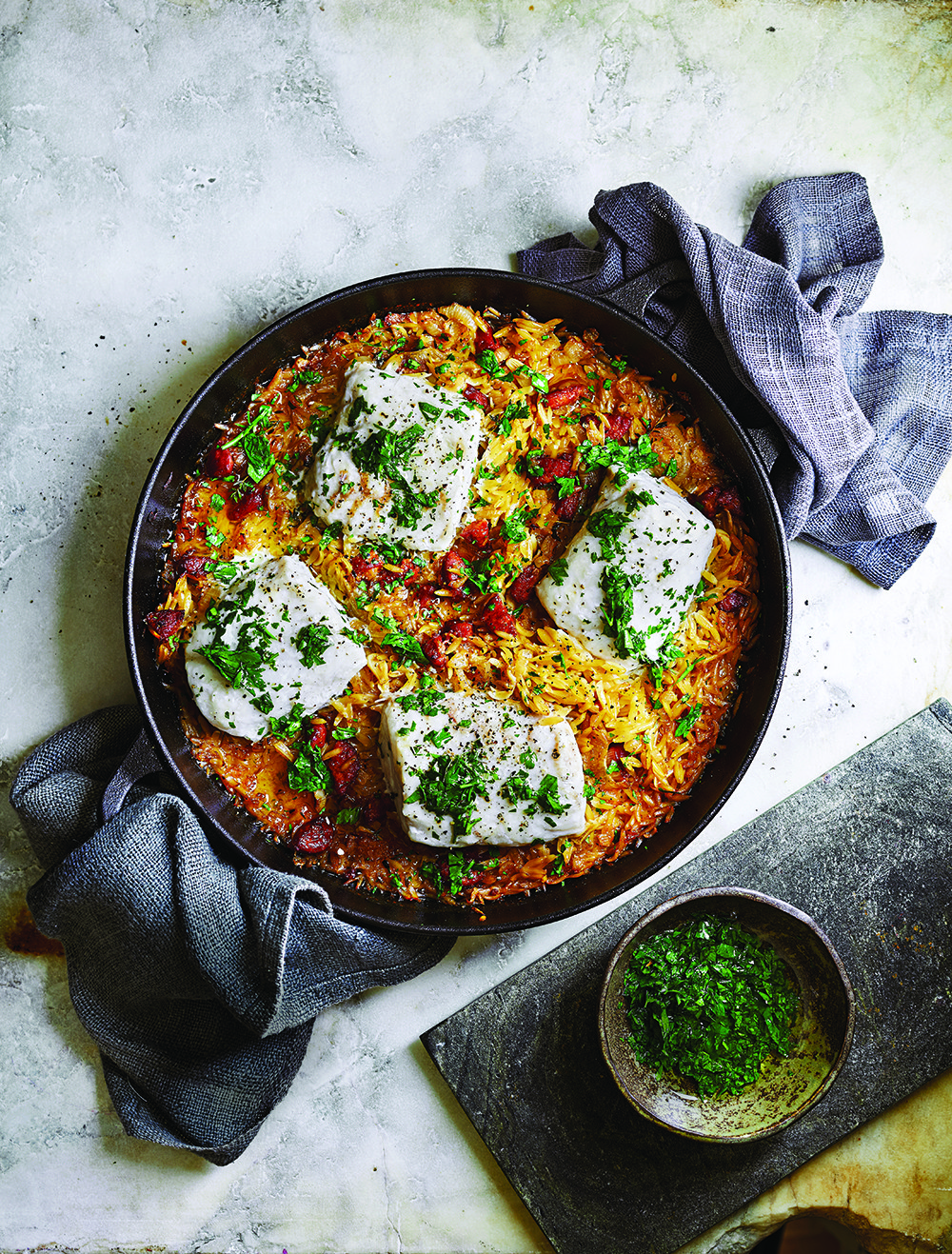Baked chorizo orzo with hake