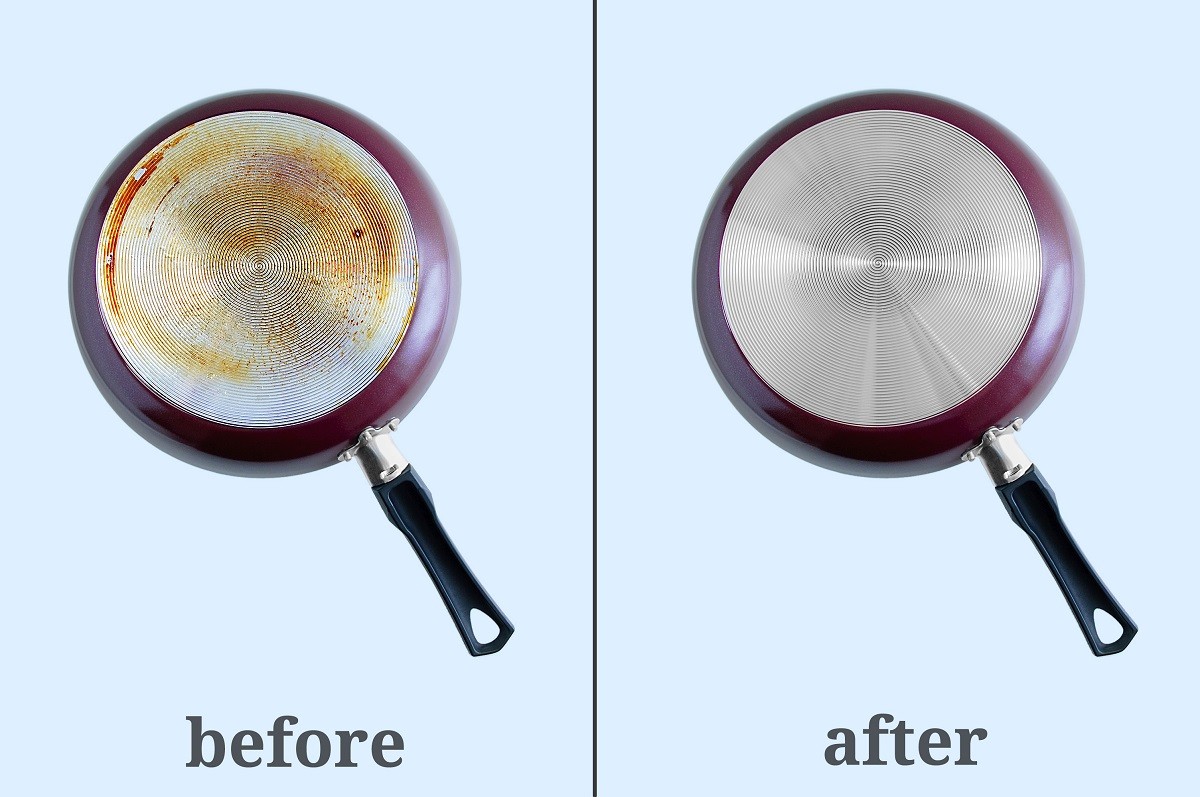 Cleaning carbon deposits on kitchen utensils. Dirty pan bottom a