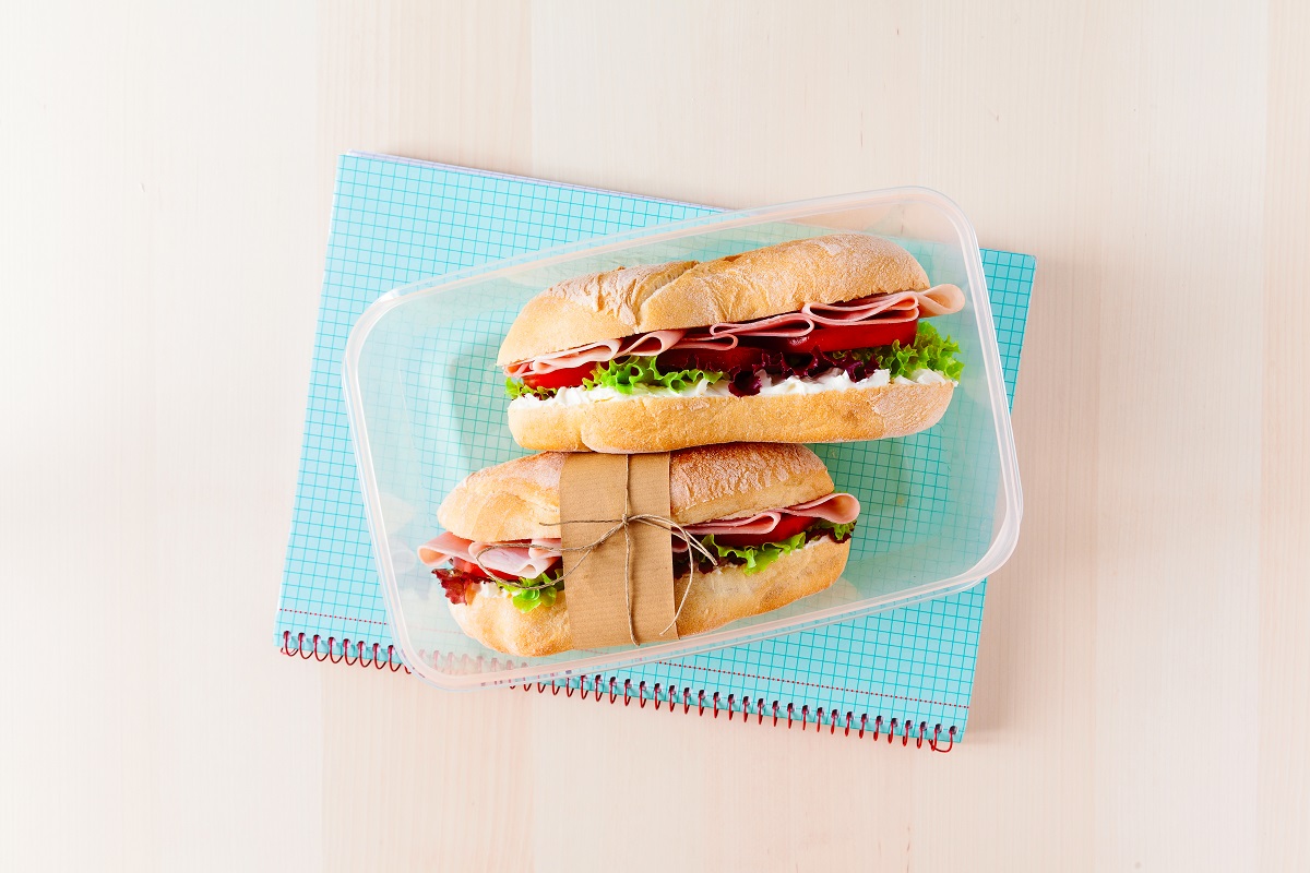 Sandwich with fresh bread, with Italian ham and fresh tomatoes,
