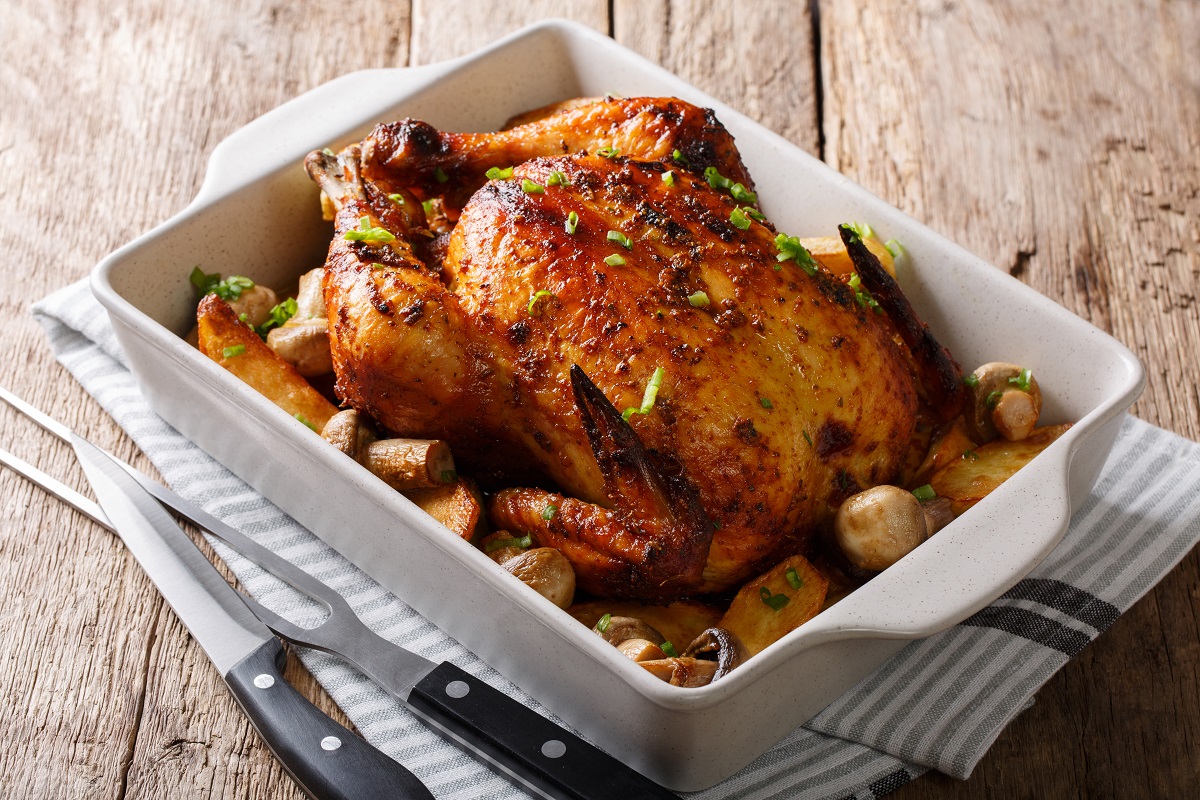 Beautiful crispy grilled chicken with mushrooms and potatoes clo