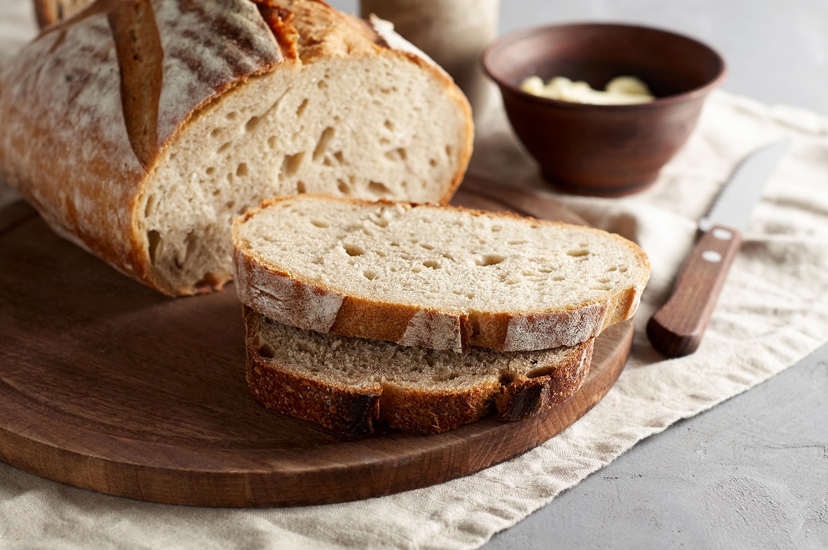 Artisan,Sliced,Toast,Bread,With,Butter,And,Sugar,On,Wooden