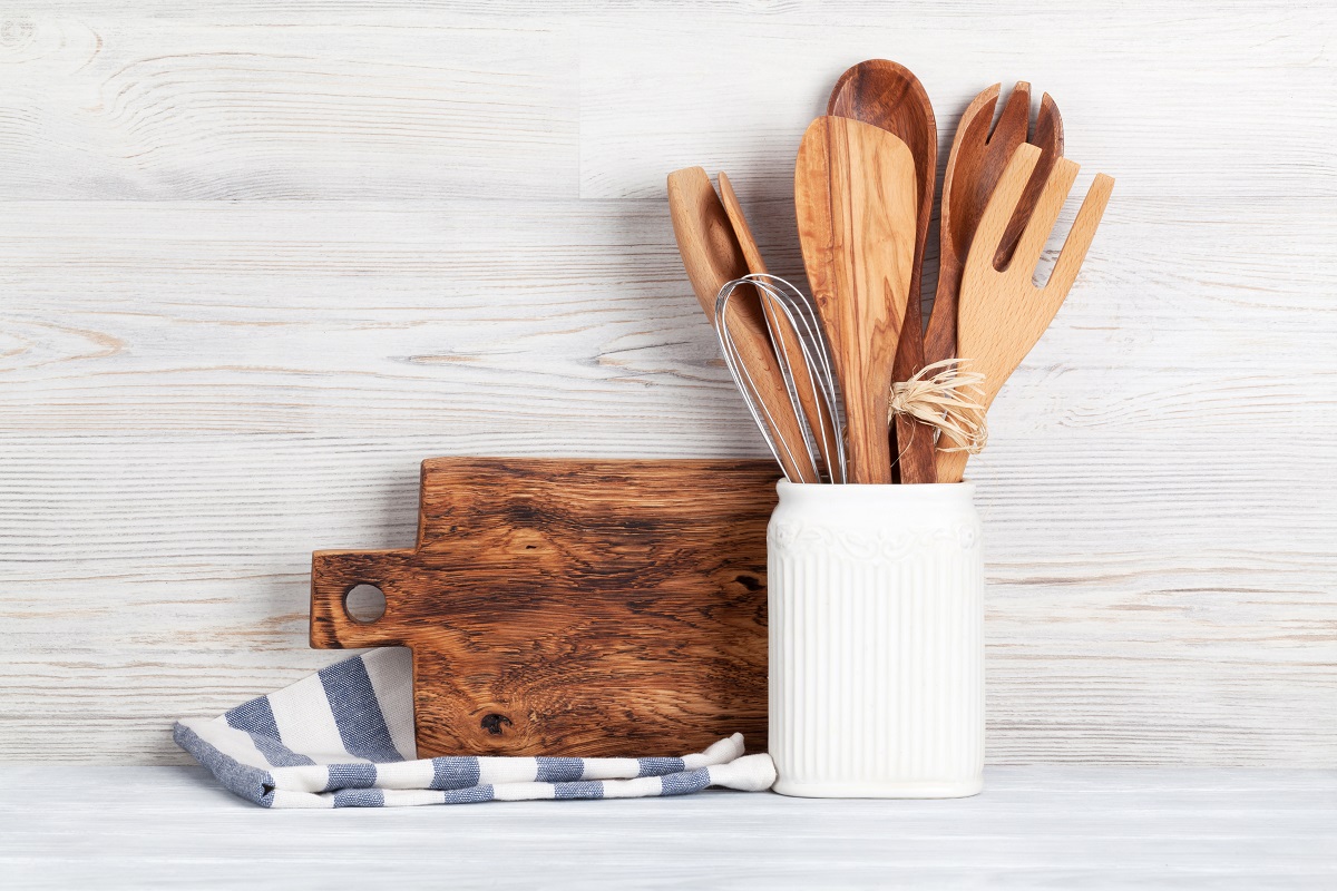 Kitchen,Utensils,In,Front,Of,Wooden,Wall,With,Space,For