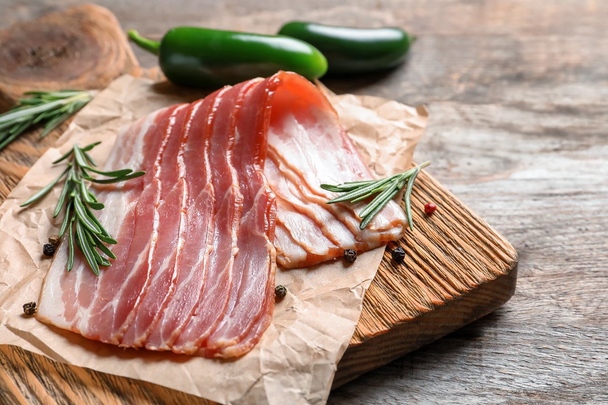 Board,With,Raw,Bacon,On,Table,,Closeup