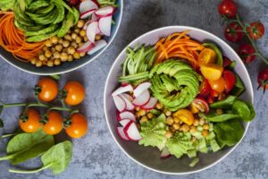 Buddha,Bowl,Of,Mixed,Vegetable,With,Avocado,,Carrots,,Spinach,,Romsnesco