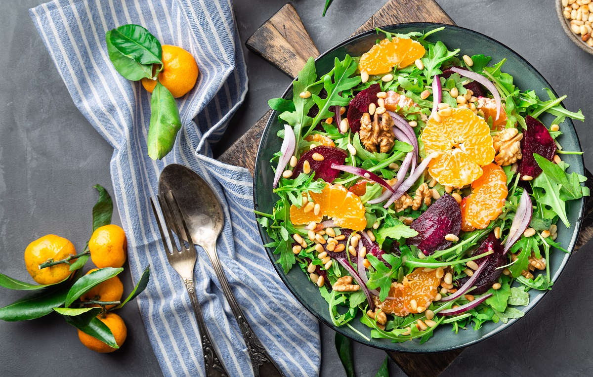 Fresh,Homemade,Tangerine,And,Beet,Salad,With,Arugula,,Walnuts,And