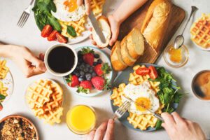 Fried,Egg,,Spinach,,Waffles,And,Cup,Of,Coffee,Espresso,,Bread,