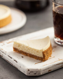 Close-up,Of,A,Triangular,Slice,Of,Cheesecake,Cake,On,A