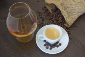 Italian,Espresso,And,Cognac,On,Wooden,Table