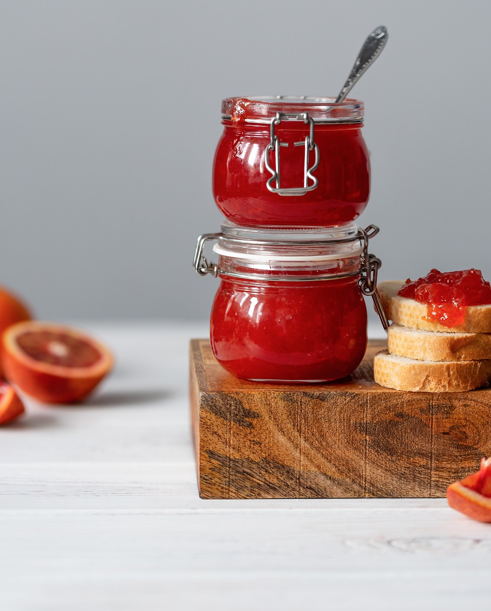 Two,Jars,Of,Homemade,Blood,Orange,Jam.,Baguette,With,Orange