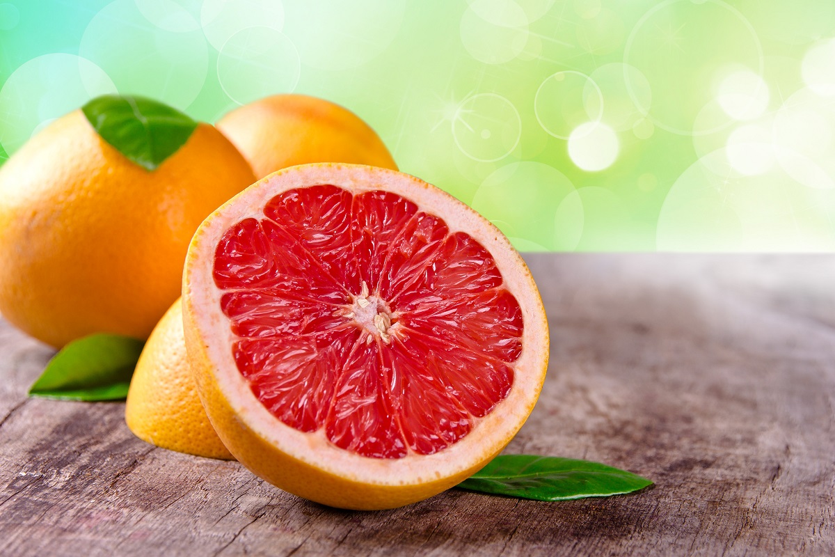 Freshly,Harvested,Grapefruit,On,Wooden,Background