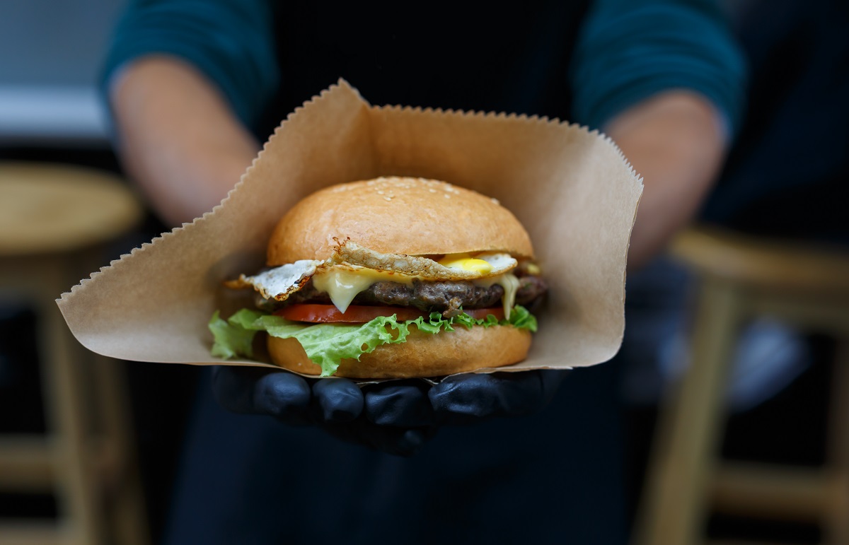 Fresh,Burger,Cooked,At,Barbecue,Outdoors,In,Craft,Paper.,Cookout
