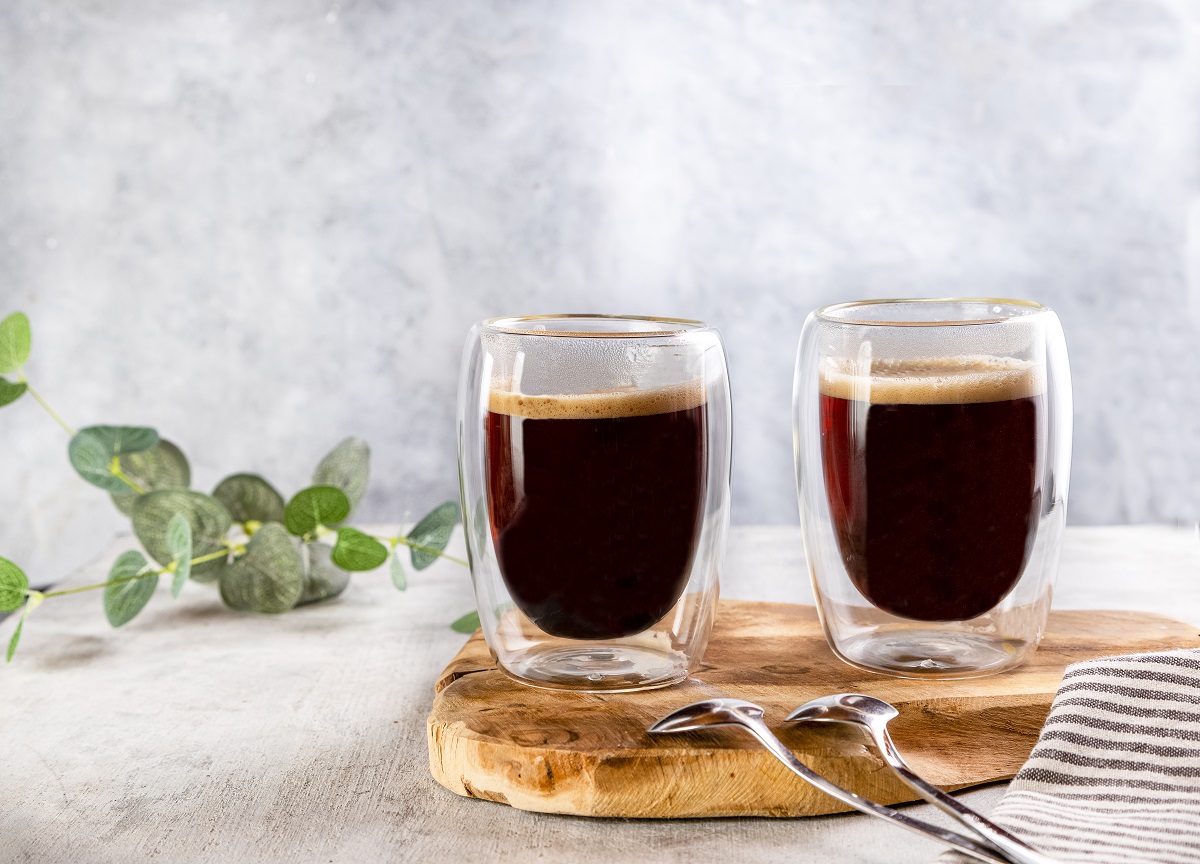 A,Glass,Double-sided,Cups,Of,Coffee,With,Coffee,In,It