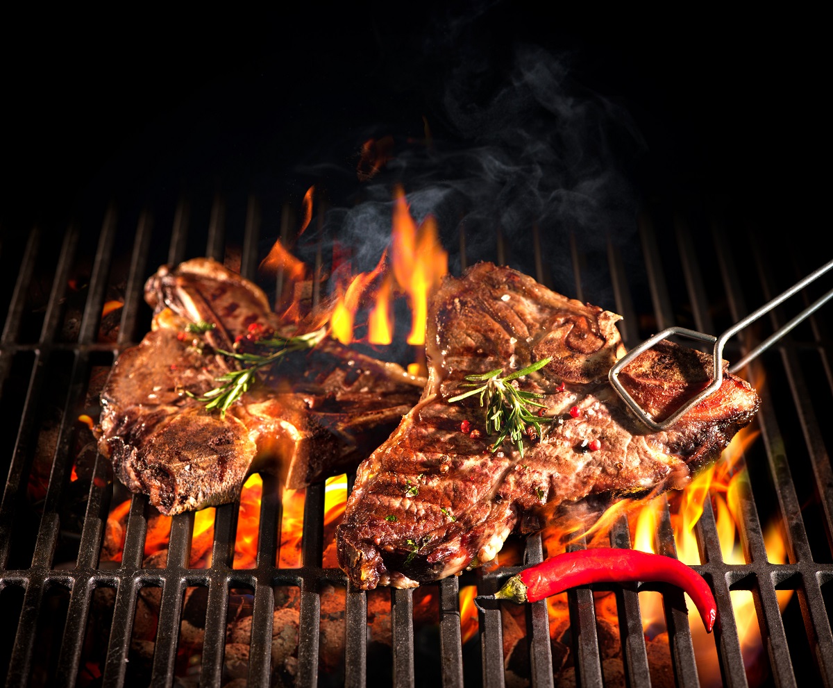 Beef,T-bone,Steaks,On,The,Grill,With,Flames