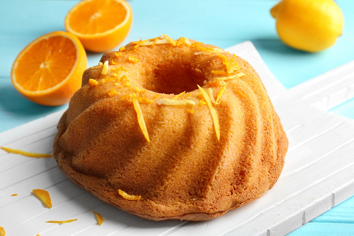Delicious,Citrus,Cake,With,Orange,Zest,On,Table