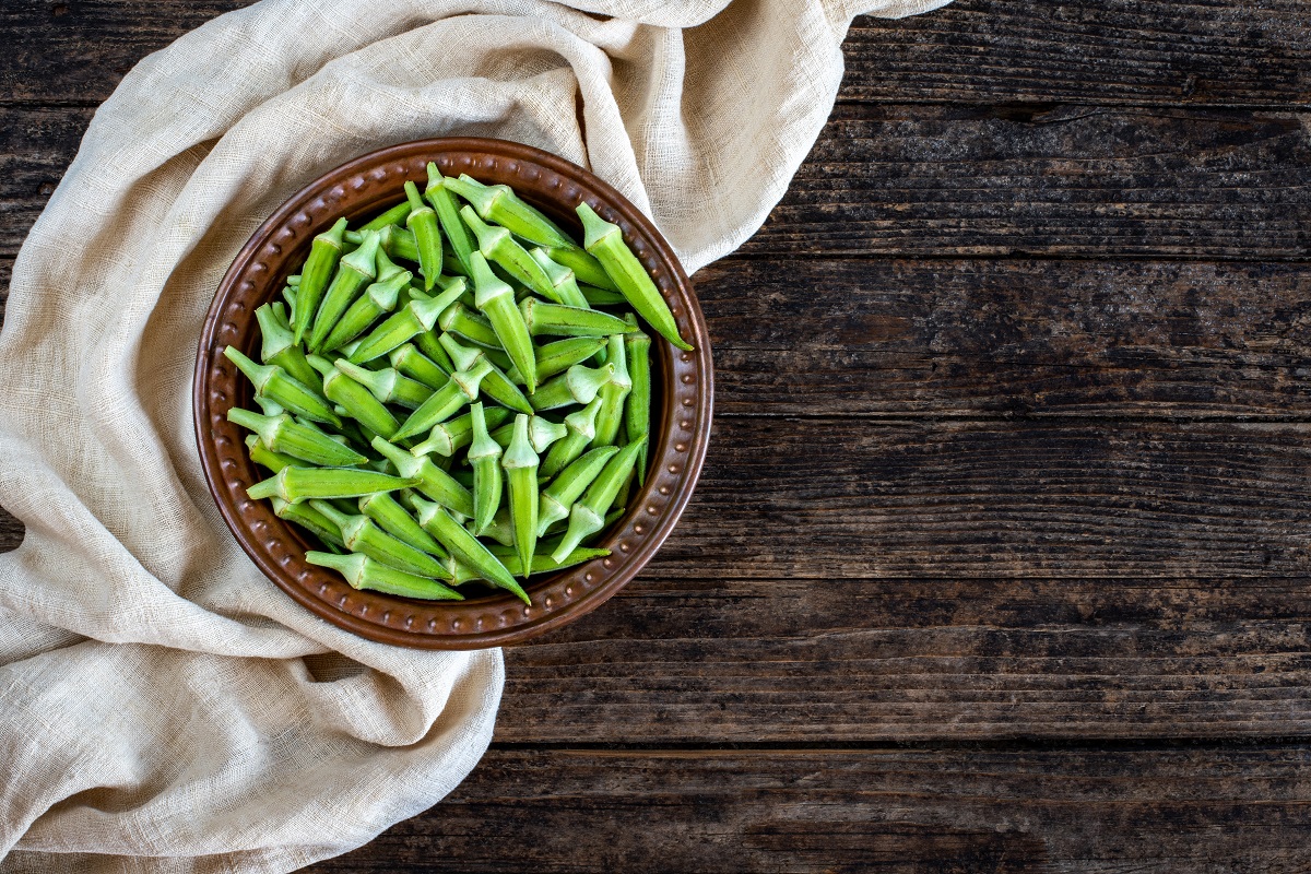 Okra,In,The,Copper,Bowl,At,The,Hands,Of,Two