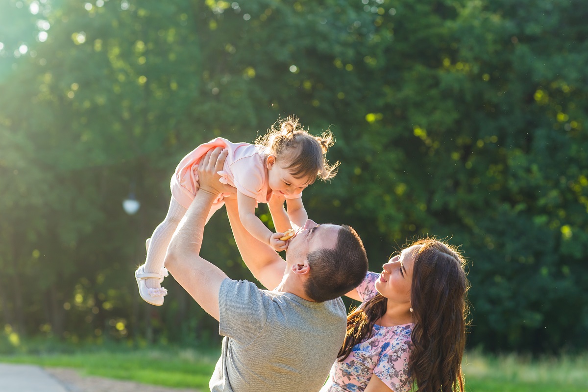 Happy,Family,Concept,-,Father,,Mother,And,Child,Daughter,Having