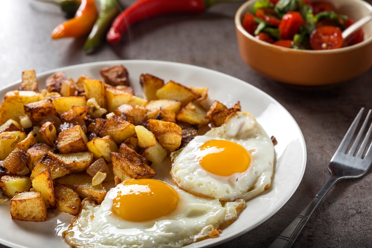 Eggs,And,Fries,With,Small,Pieces,Of,Fat,Pork,Meat,