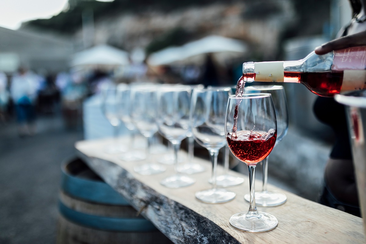 Pouring,Red,Wine,At,Social,Event,Life,Wedding,Party,Or