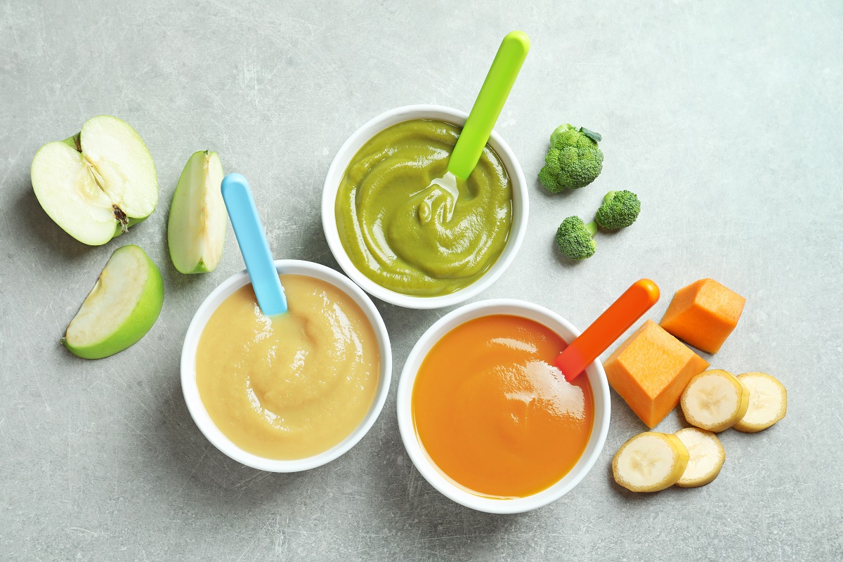 Bowls,With,Baby,Food,On,Grey,Background