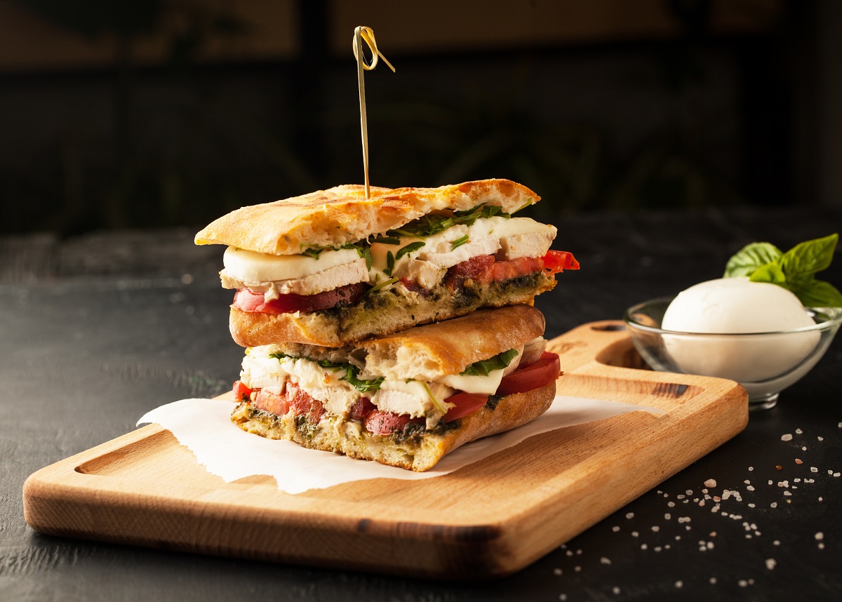 Delicious,Sandwich,With,Chicken,And,Mozzarella,Cheese,On,A,Dark