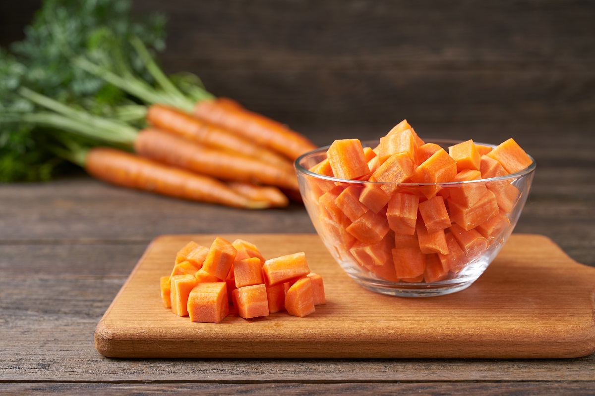 Diced,Carrots,On,A,Wooden,Table,,Selective,Focus,,Rustic,Style.dice