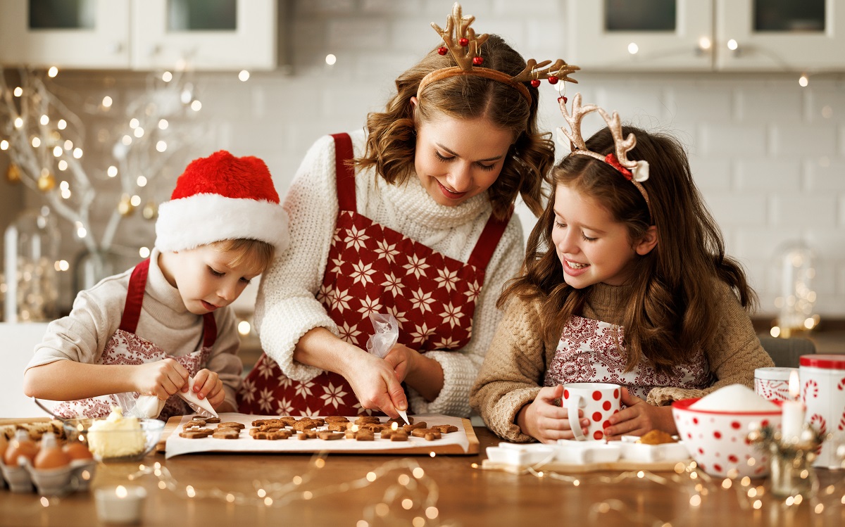 Happy,Family,Mother,And,Two,Kids,In,Festive,Outfit,Making