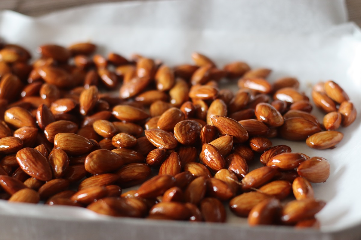 Candied,Almonds.,Toasted,Almonds,Coated,With,Caramel,Syrup.,Shot,Inside