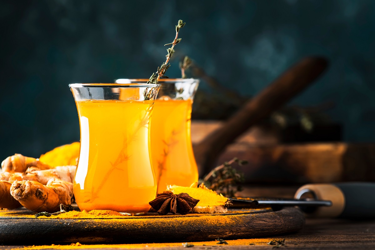 Healthy,Vegan,Turmeric,Golden,Tea,With,Honey,In,Glass,Cup