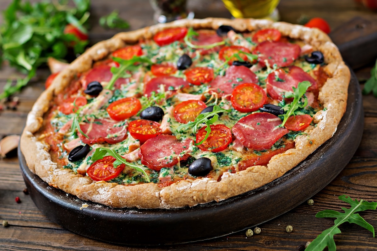 Pizza,With,Salami,,Tomatoes,,Olives,And,Cheese,On,A,Dough