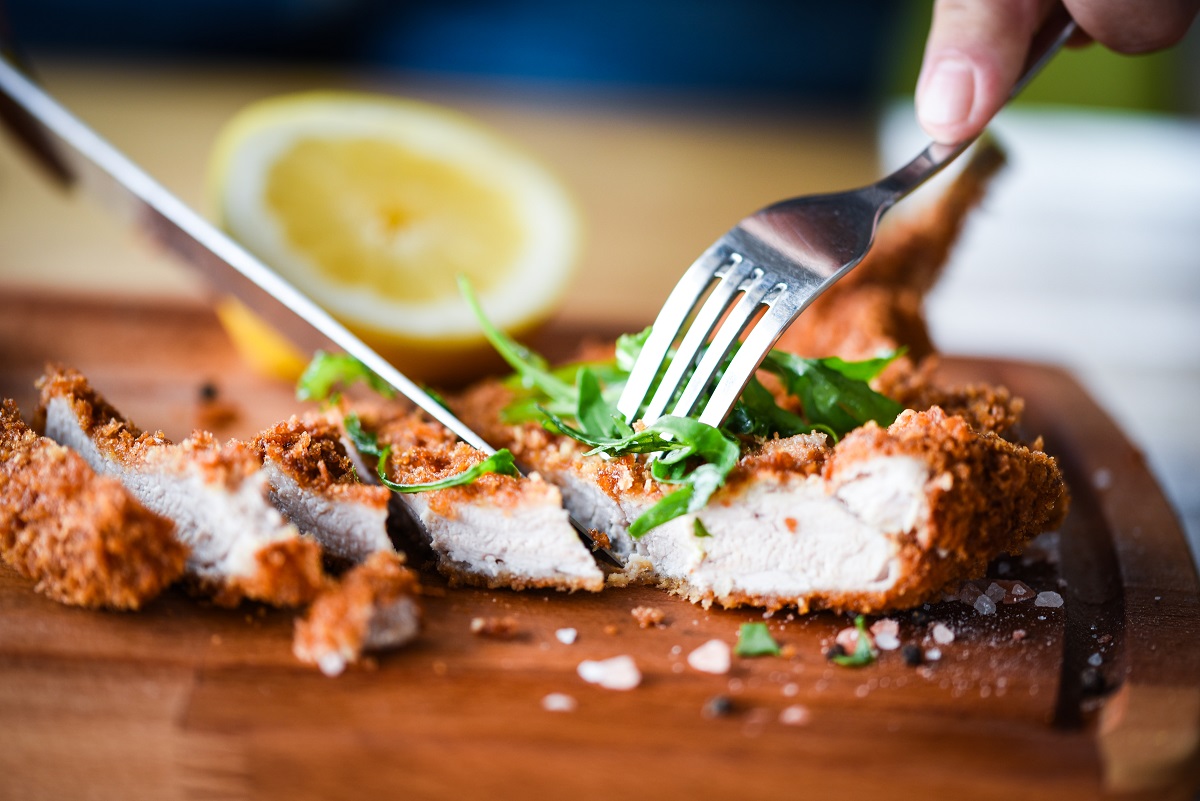 Delicious,Crispy,Panko,Pork,Schnitzel,With,Wedges,&,Fresh,Pepper