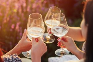 A,Group,Of,Girlfriends,Raise,A,Toast,With,Glasses,Of