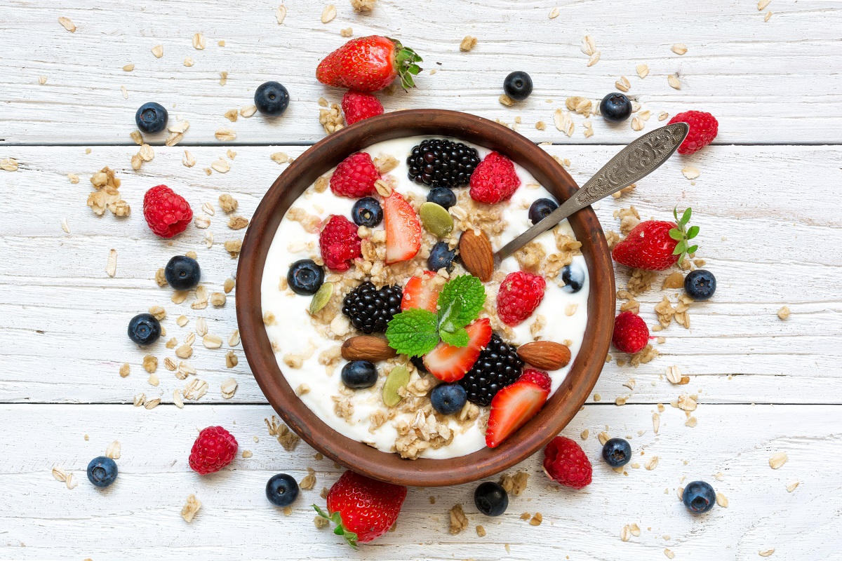 Bowl,Of,Oat,Granola,With,Yogurt,,Fresh,Raspberries,,Blueberries,,Strawberries,
