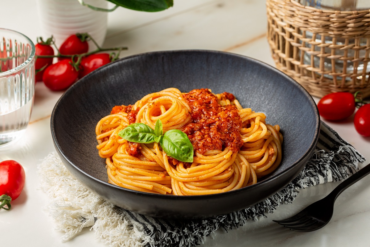 Dinner,With,A,Plate,Of,Spaghetti,With,Vegan,Bolognese,Sauce
