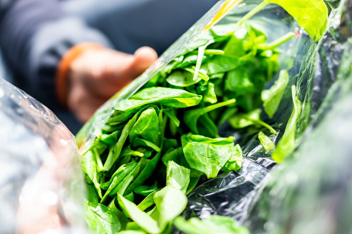 Closeup,Of,Person,Hands,Holding,Fresh,Raw,,Plastic,Packaged,Bag
