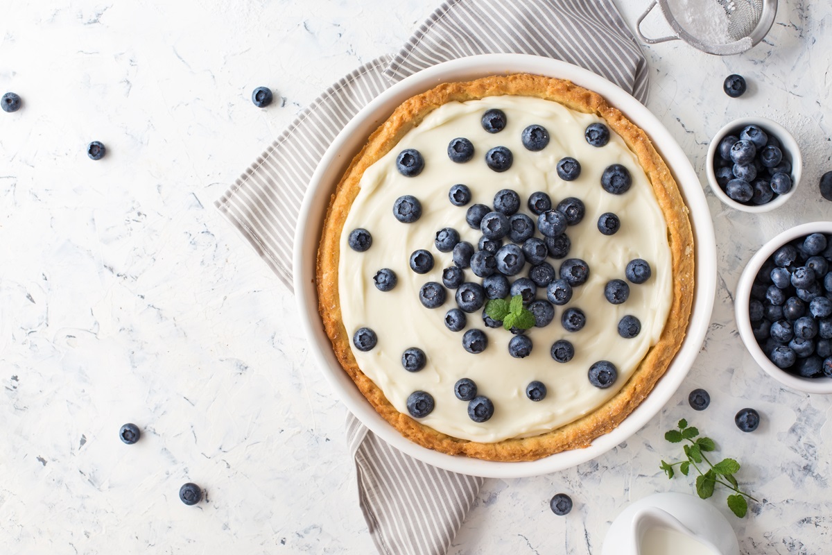 Blueberry,Tart,With,Whipped,Cream.,Top,View,,Copy,Space