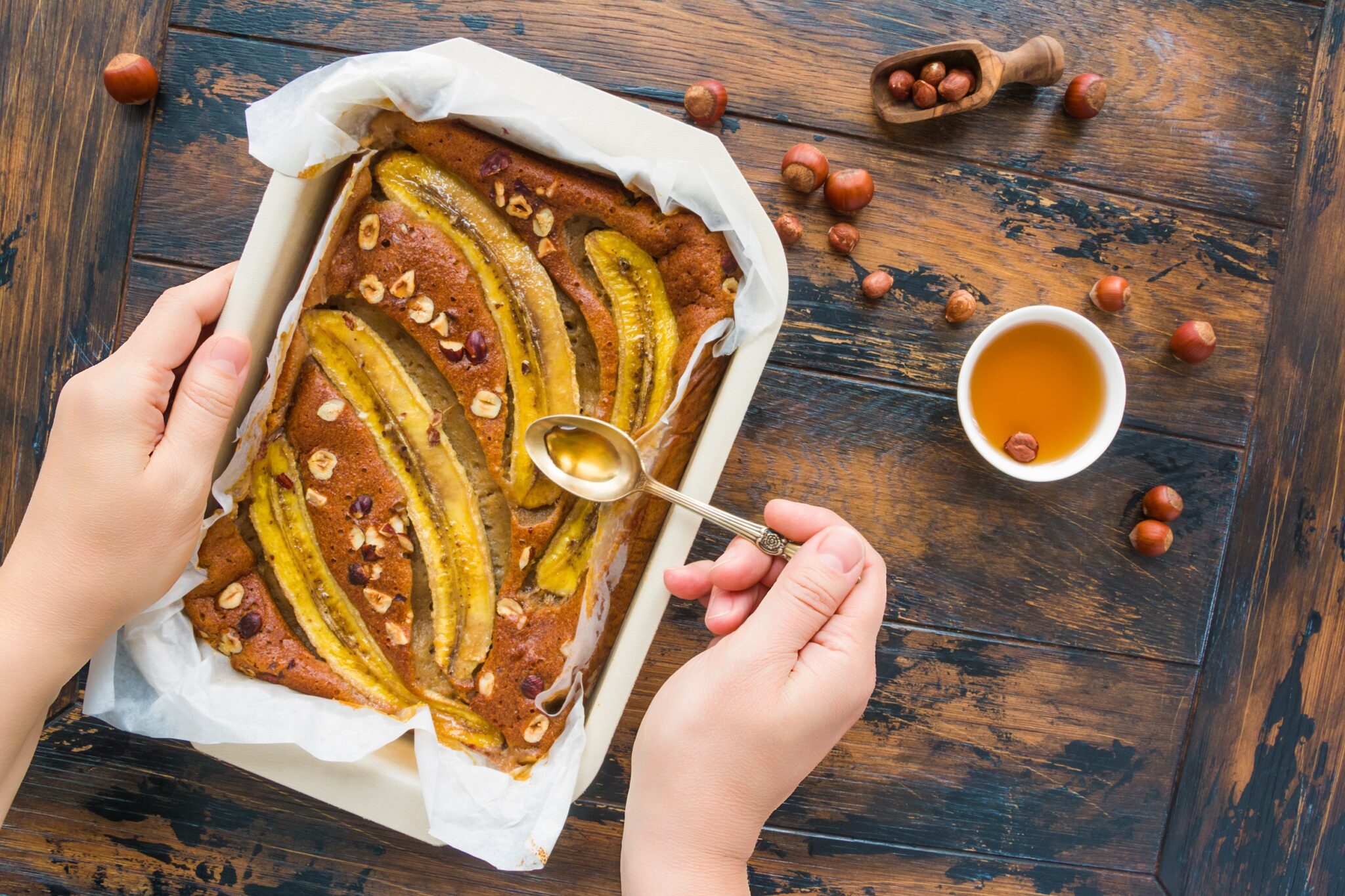Homemade,Fruit,Banana,And,Hazelnut,Cake,In,A,Baking,Dish.