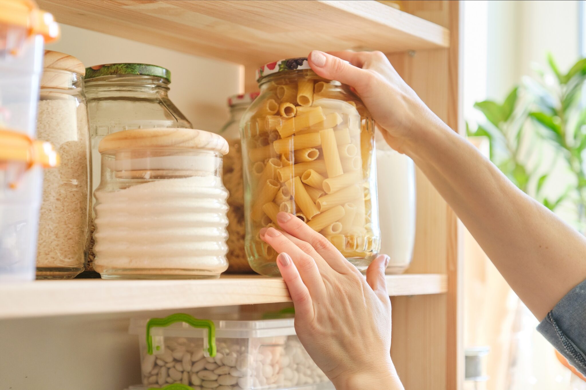 Food,Products,In,The,Kitchen,Storing,Ingredients,In,Pantry.,Woman