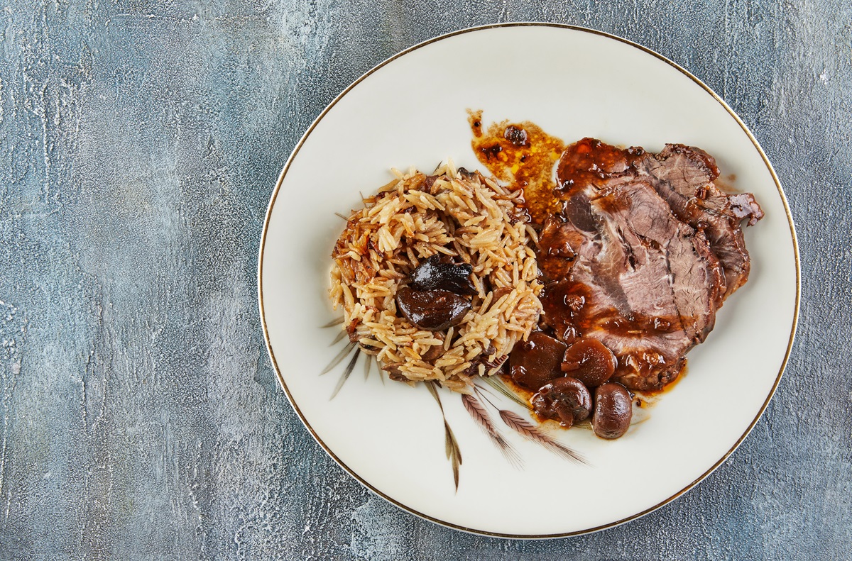 Beef,In,Sauce,With,Mushrooms,And,Chestnuts,And,Risotto.,French