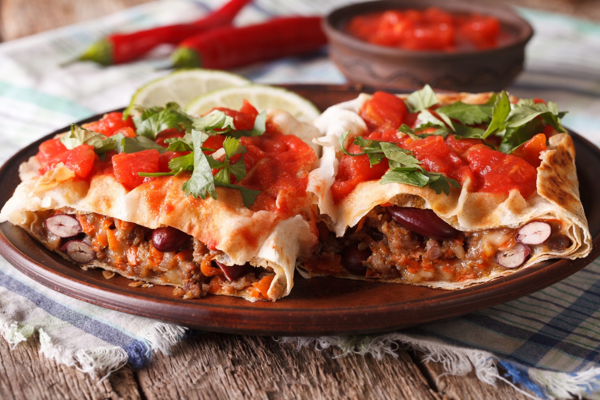 Mexican,Rolls:,Chimichanga,With,Tomato,Salsa,On,A,Plate,Close-up